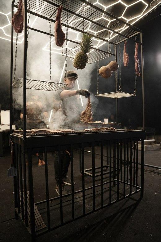 Premium barbecue with grilled meats, vegetables, and sauces