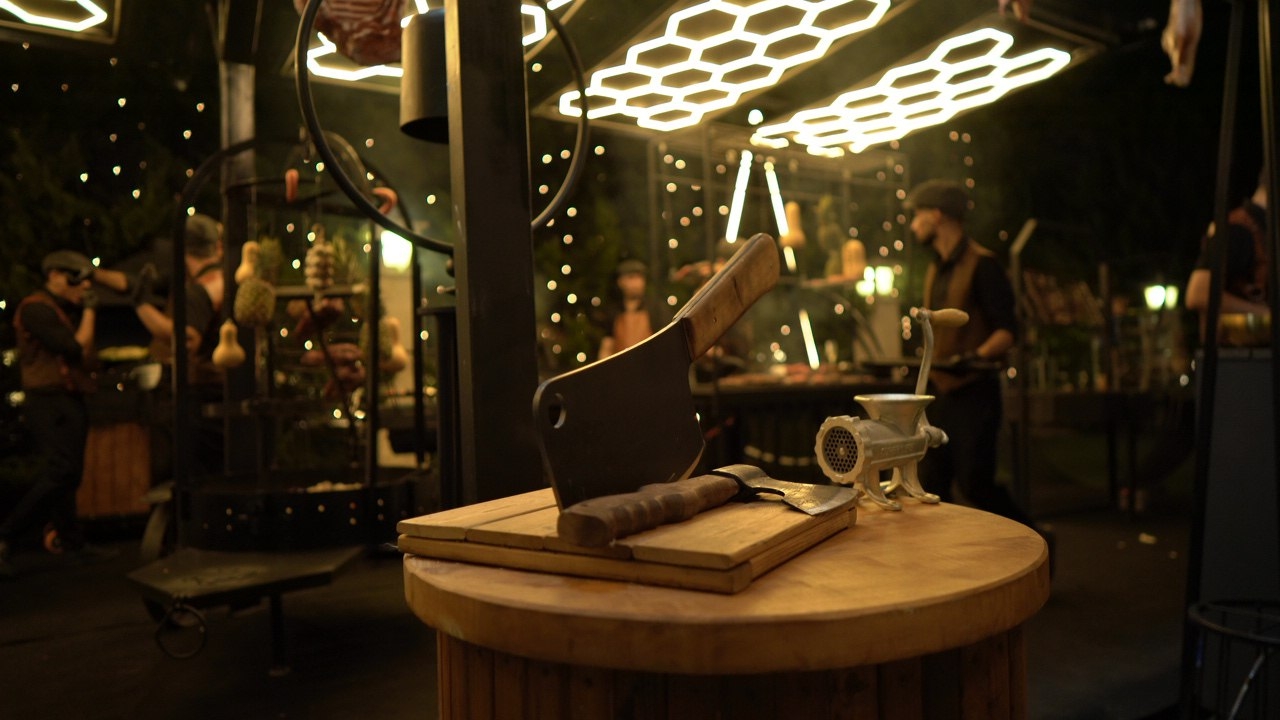 Mini barbecue set with skewers and grilled meat