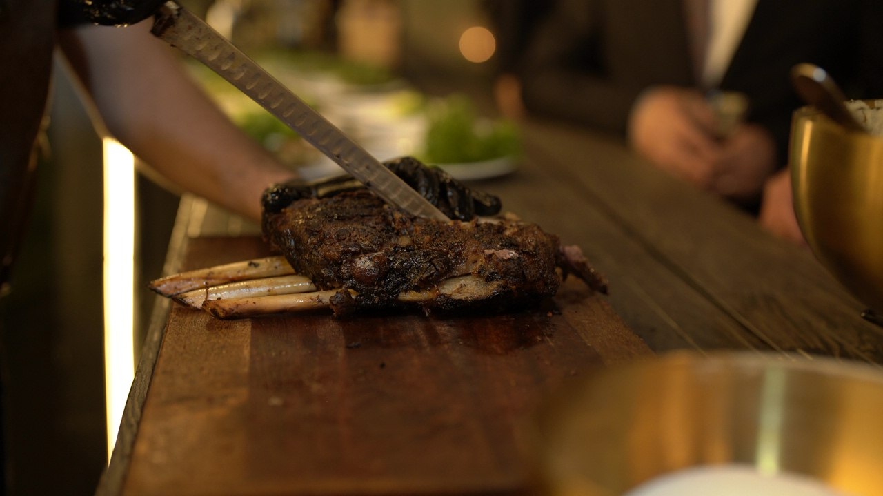 Premium barbecue with grilled meats, vegetables, and sauces