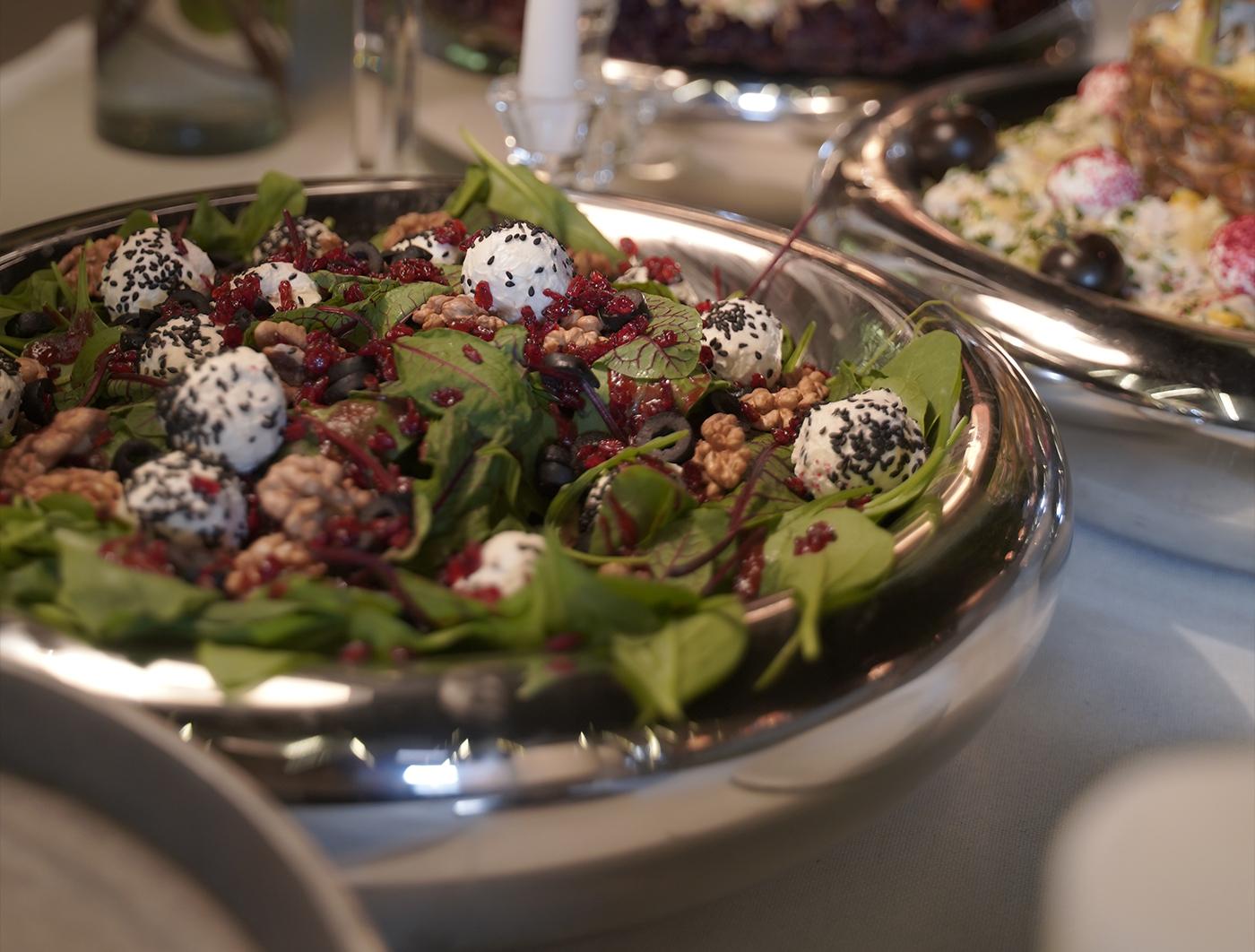 Fresh salad with greens, tomatoes, and dressing