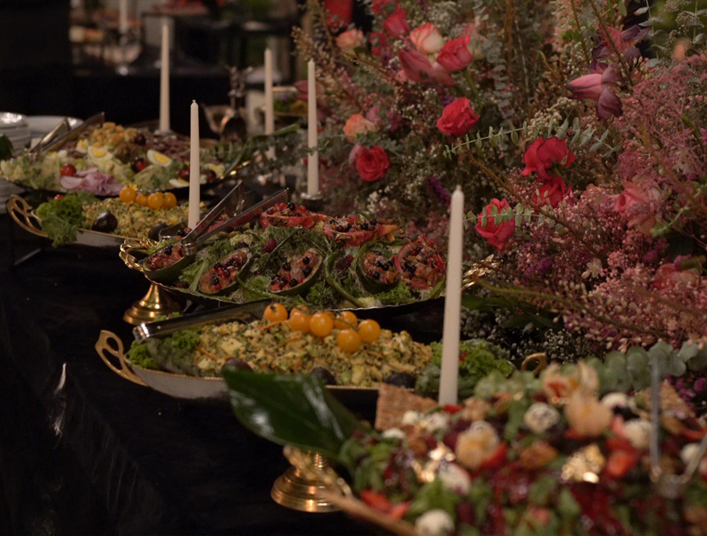 Fresh salad with greens, tomatoes, and dressing
