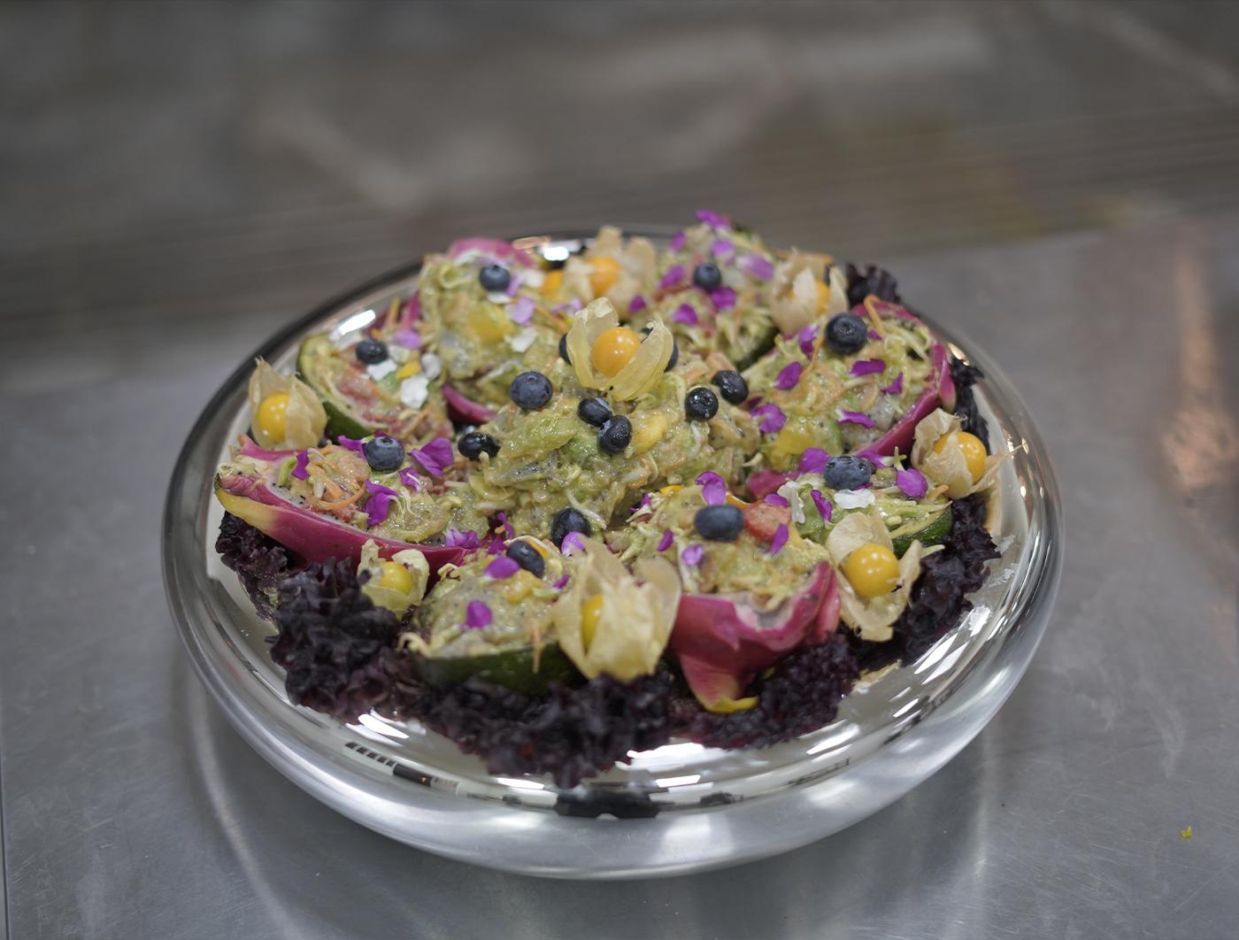 Fresh salad with greens, tomatoes, and dressing