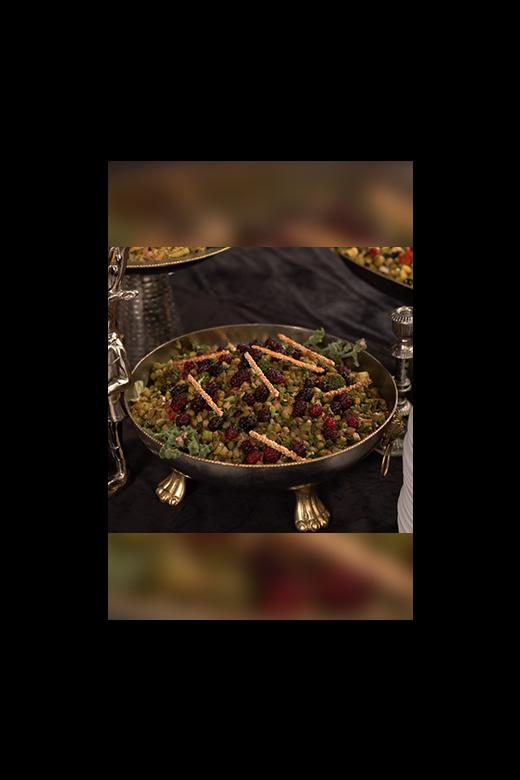 Fresh salad with greens, tomatoes, and dressing